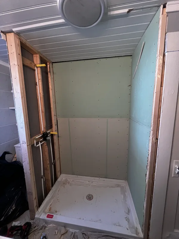 Moisture-resistant greenboard wall preparation