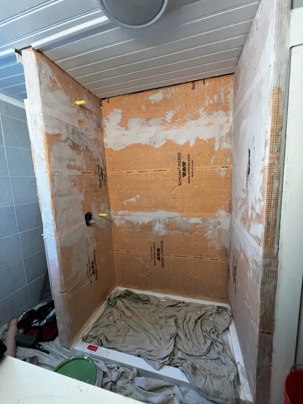 Schluter Kerdi waterproofing membrane installation