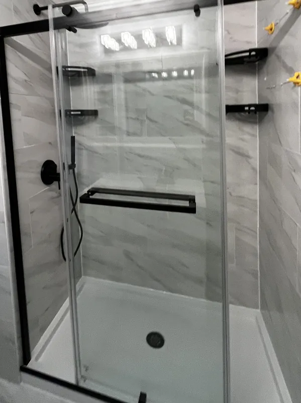 Close-up of matte black fixtures and tile detail